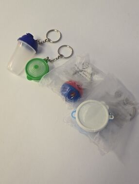 Vntg Tupperware Mini Key Chains Set Of 4 EUC/NIB